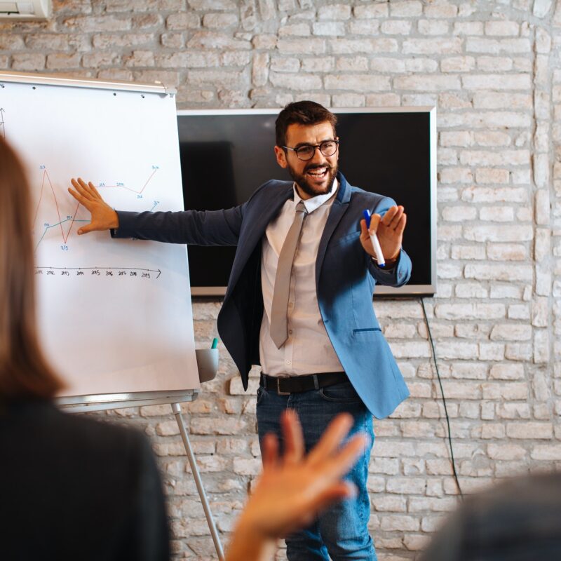 Business man making a presentation at office.