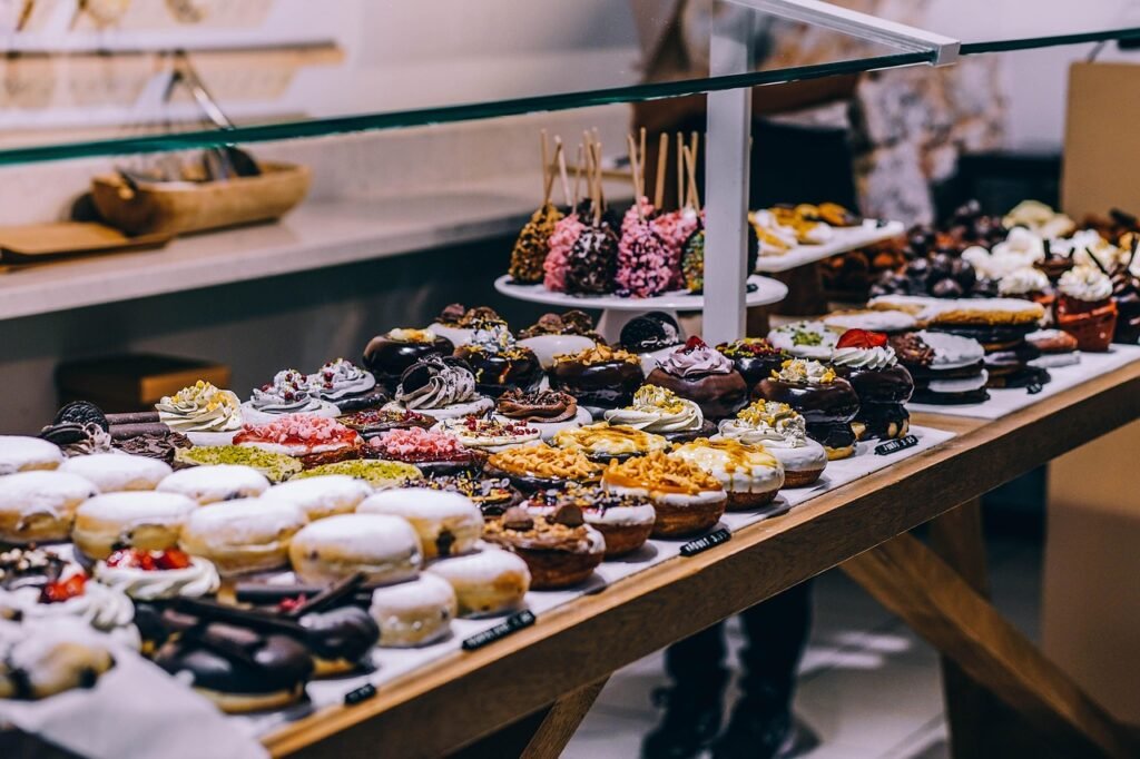 doughnuts, desserts, pastries, treats, produits sweets, pastry shop, dessert shop, assorted, assortment, display, shop, store, baked goods, bake shop, baked, bakery, buffet, chocolate, confectionery, delicious, donuts, food, products, sale, desserts, shop, bakery, bakery, bakery, bakery, bakery, buffet, buffet, buffet, chocolate, chocolate, donuts